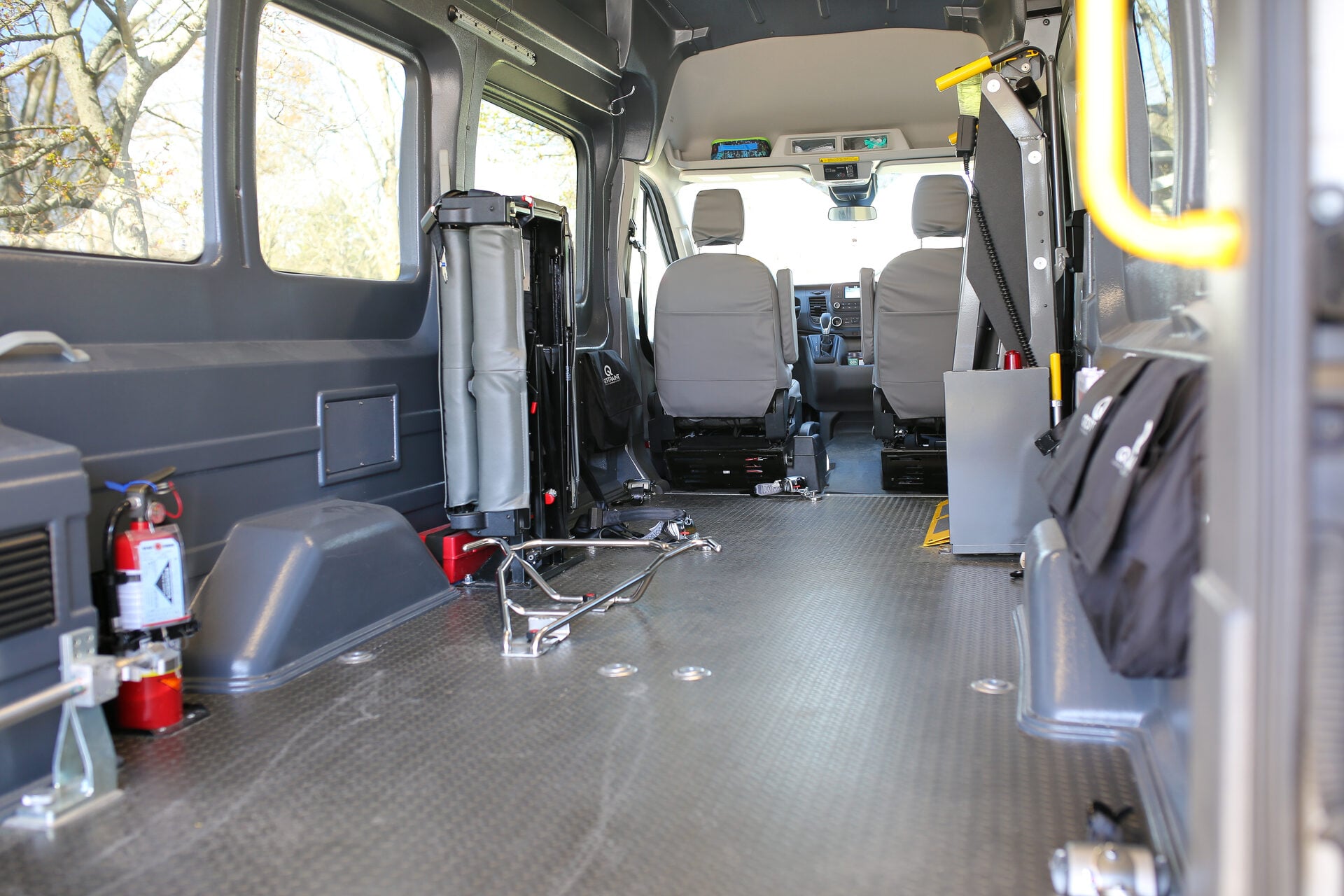 Pat & The Elephant van interior showing wheelchair securing equipment and accessible features